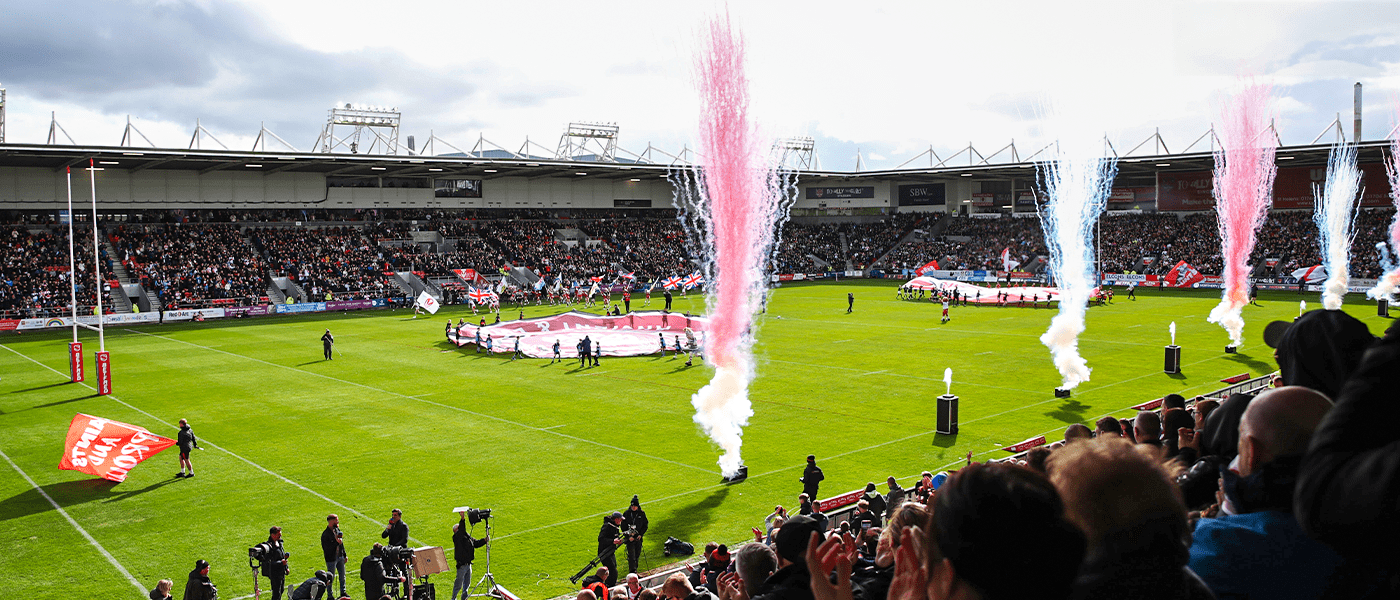 start of rugby event with smoke going off