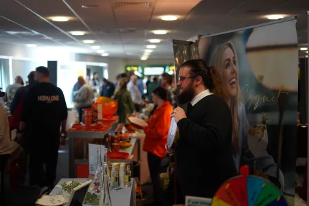 long haired and bearded man at expo