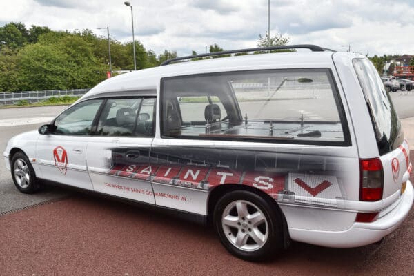 close up of white funeral car