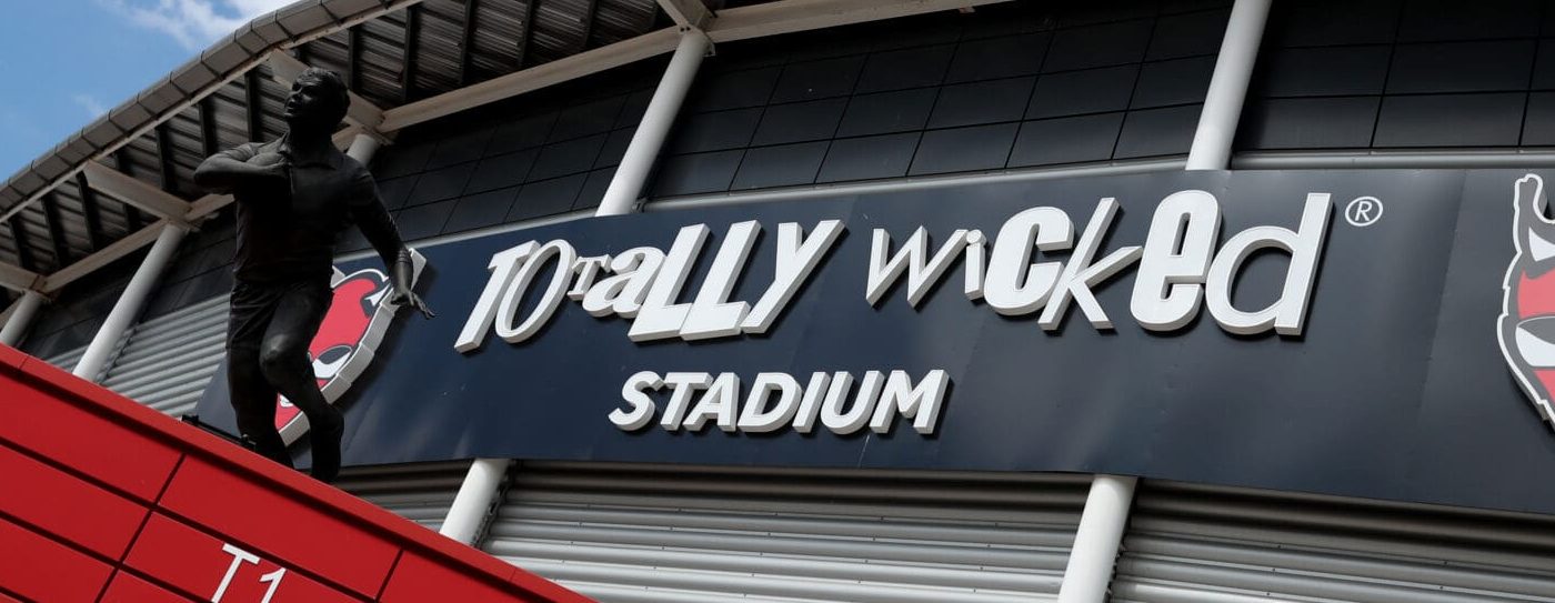 entrance to stadium with statue