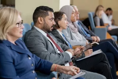 people sitting at conference