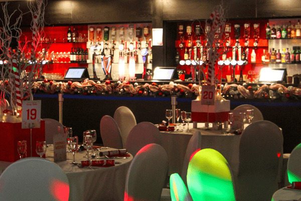 white tables with candy cane decorations