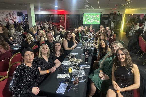 long table with women seated for bingo